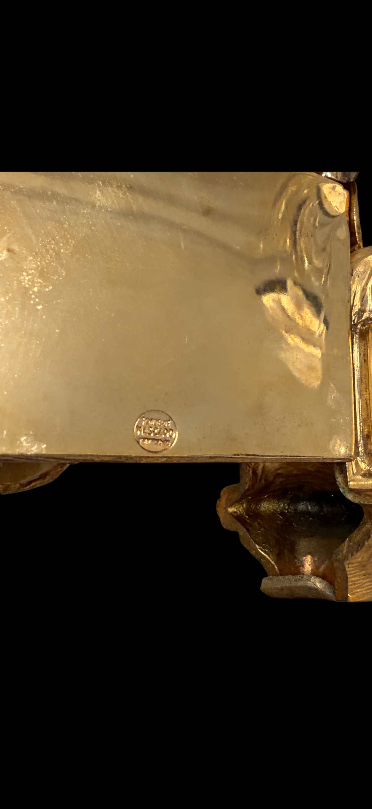 Garniture de cheminée d'après Auguste Moreau, pendule et paire de candélabres aux putti, bronze doré et patiné