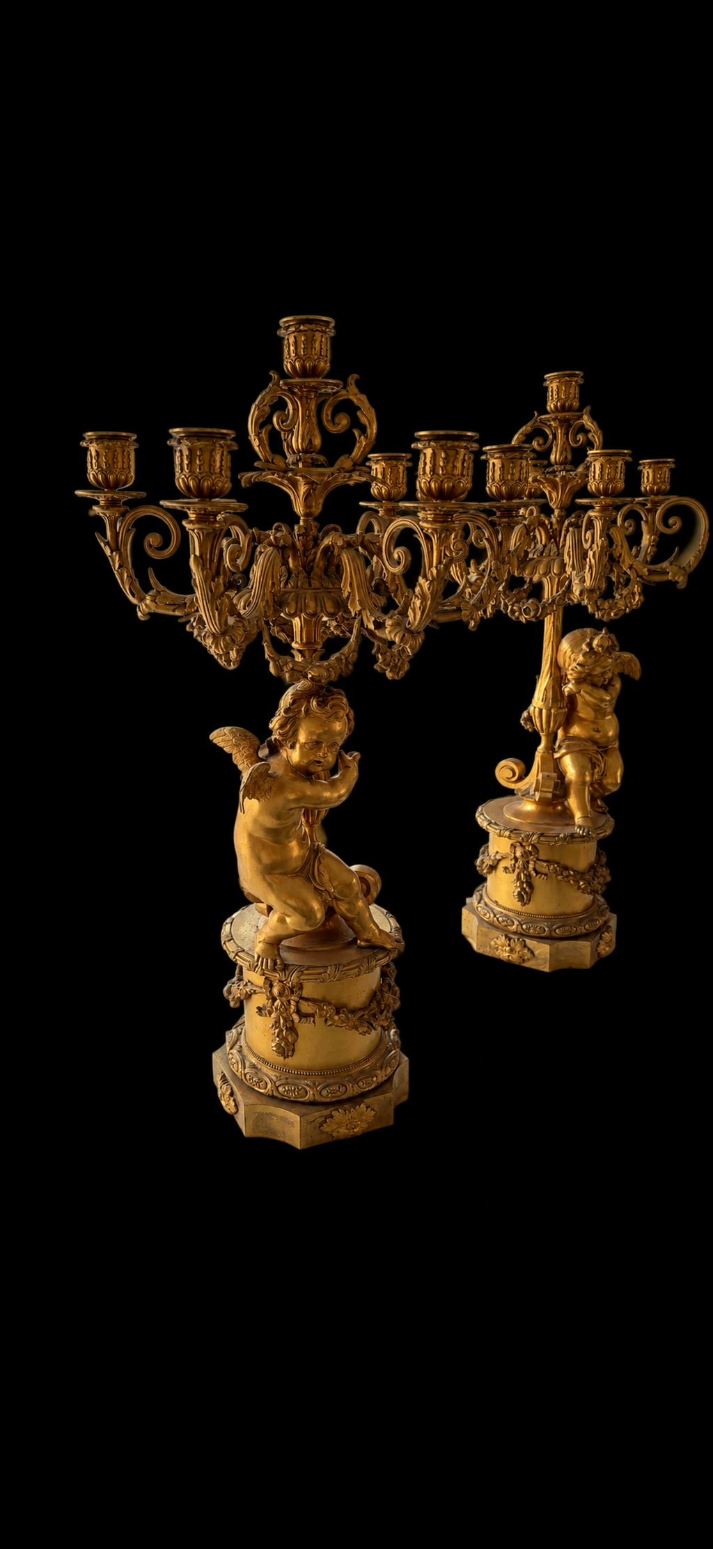 Paire de candélabres aux amours à sept lumières, bronze doré, XIXe siècle